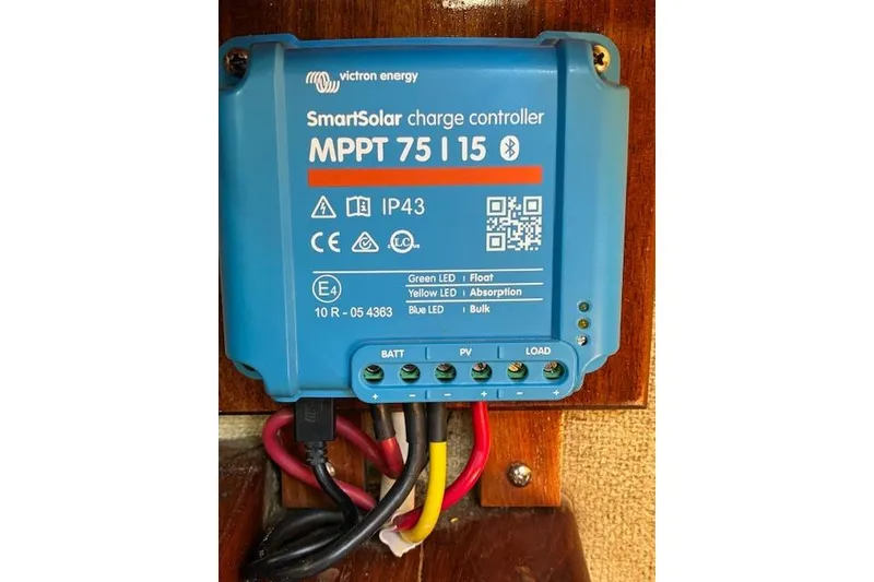 Slide: The Image of Victron Energy SmartSolar charge controller MPPT 75/15 on Pearson 34, 1984 model. - 18