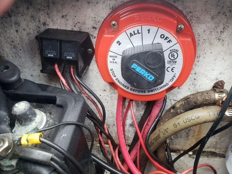 Slide: The Image of Battery switch and wiring in a 2008 Caracal 180 boat. - 13