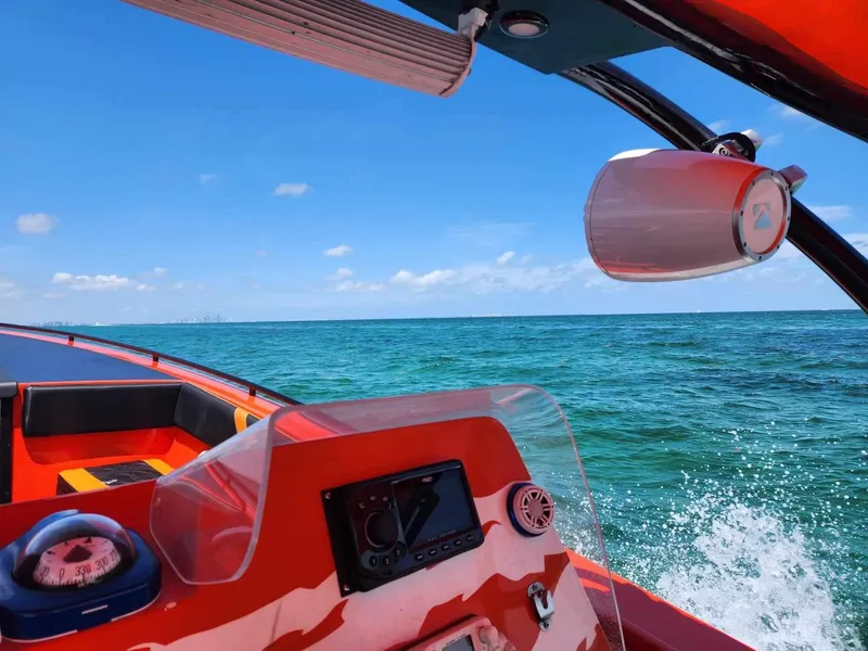 Slide: The Image of 2008 Avanti 36 boat cruising on clear blue ocean waters. - 7