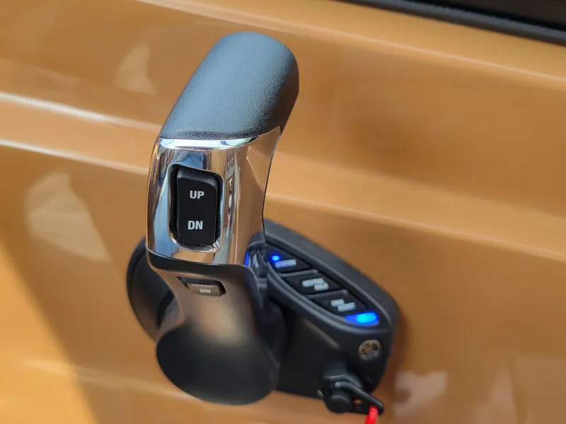 Slide: The Image of 2024 Avalon Excalibur WQL 27 Tri-Toon boat throttle control lever. - 23