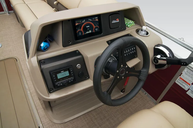 Slide: The Image of Sun Tracker Party Barge 22 XP3 2024 dashboard with steering wheel and control panel. - 32
