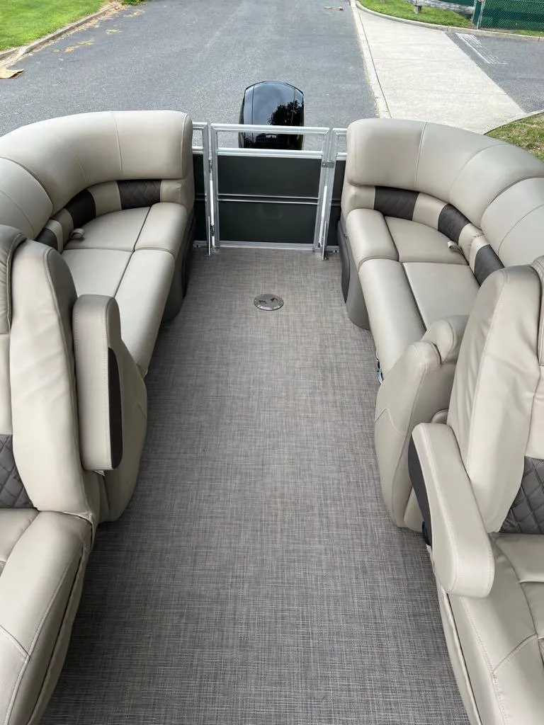 Slide: The Image of 2024 Sun Tracker Party Barge 22 XP3 interior with plush seating. - 10