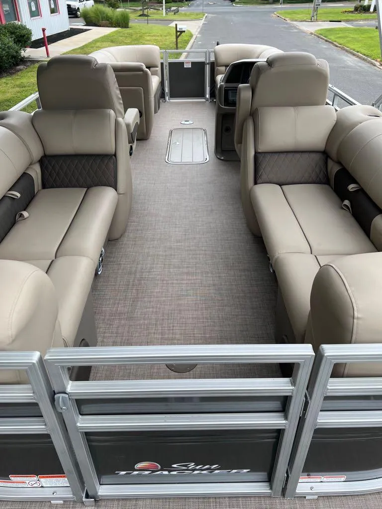 Slide: The Image of 2024 Sun Tracker Party Barge 22 XP3 interior with spacious seating and modern design. - 11