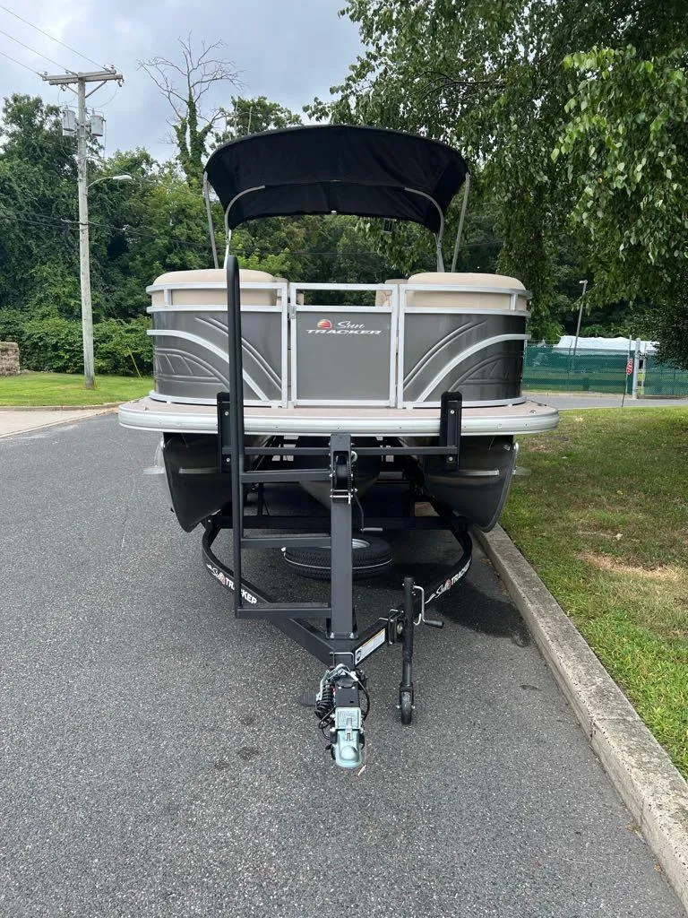 Slide: The Image of 2024 Sun Tracker Party Barge 22 XP3 pontoon boat on trailer. - 7