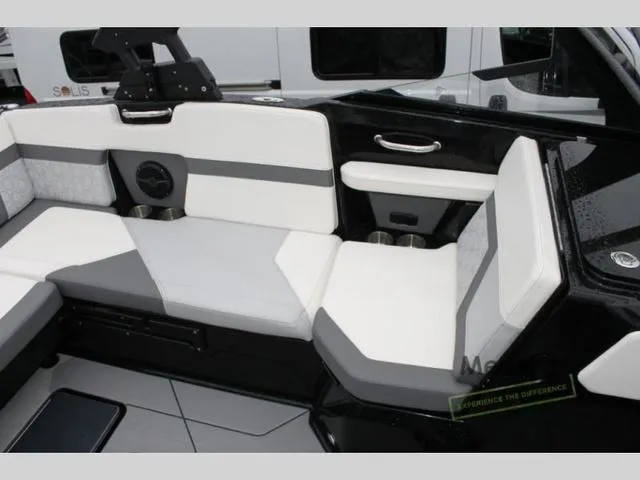 Slide: The Image of 2024 Heyday H20 boat interior with white and gray seating. - 11
