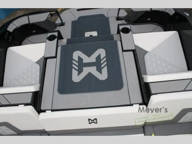 Slide: The Image of 2024 Heyday H20 boat deck with logo and seating area. - 12