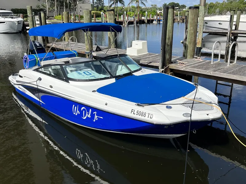 The Image of Monterey M-45 2022 boat docked at marina with blue canopy and cover. - 0