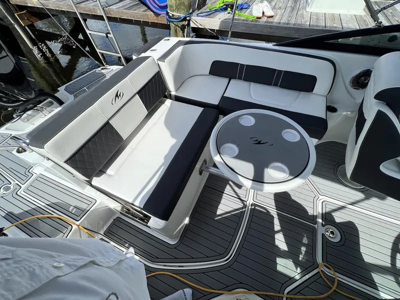 Slide: The Image of 2022 Monterey M-45 boat interior with seating and table. - 23