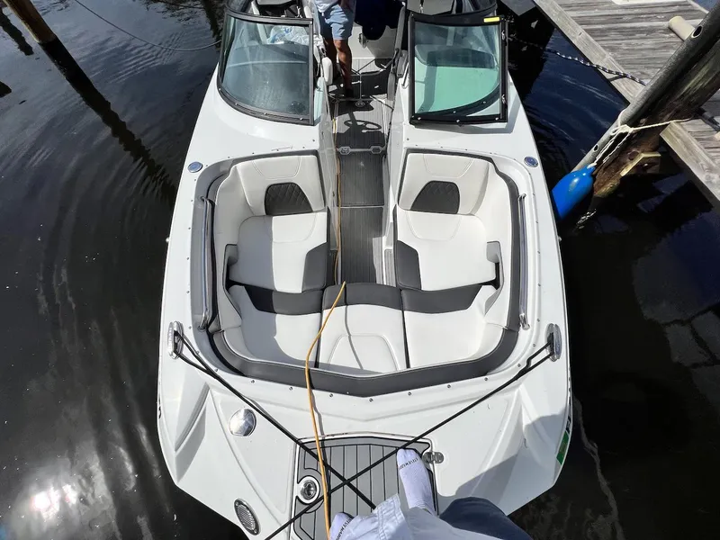 Slide: The Image of 2022 Monterey M-45 boat docked, top view of seating area and controls. - 25