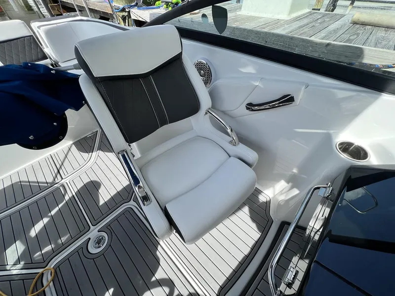 Slide: The Image of Captain's chair in a 2022 Monterey M-45 boat, featuring sleek design and modern upholstery. - 30