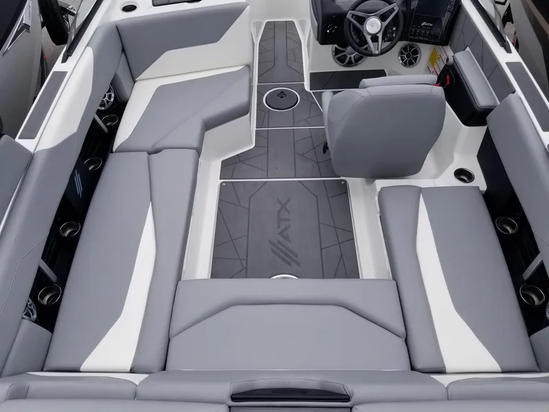 Slide: The Image of 2023 ATX Surf Boats 20 Type-S interior with gray and white seating. - 13
