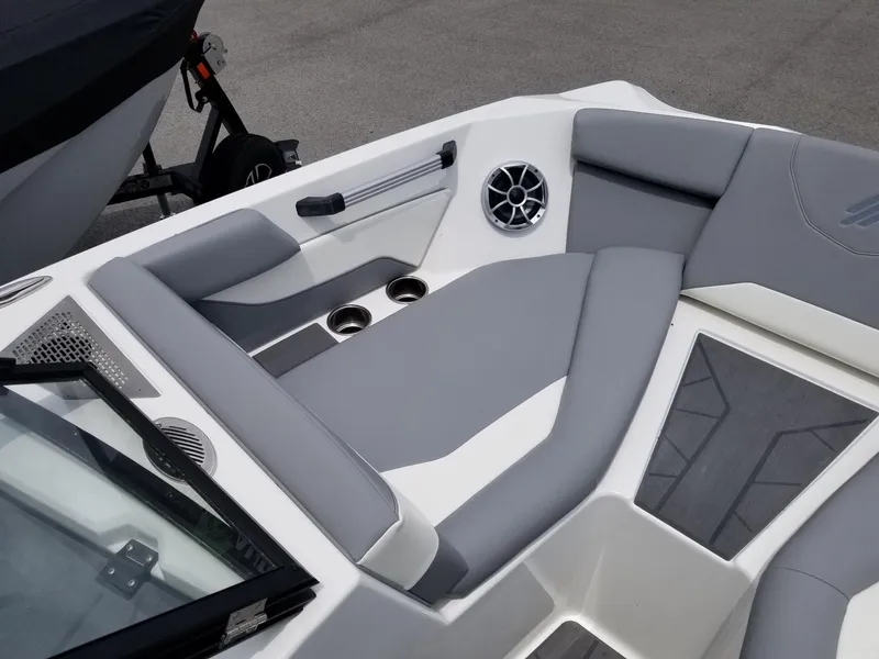 Slide: The Image of 2023 ATX Surf Boats 20 Type-S interior with gray and white seating. - 19