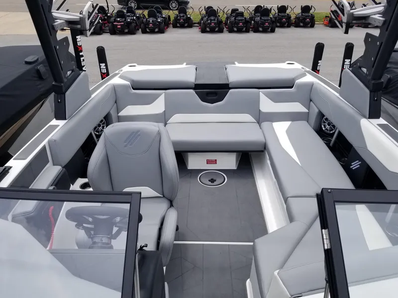 Slide: The Image of 2023 ATX Surf Boats 20 Type-S interior with gray seating and modern design. - 21