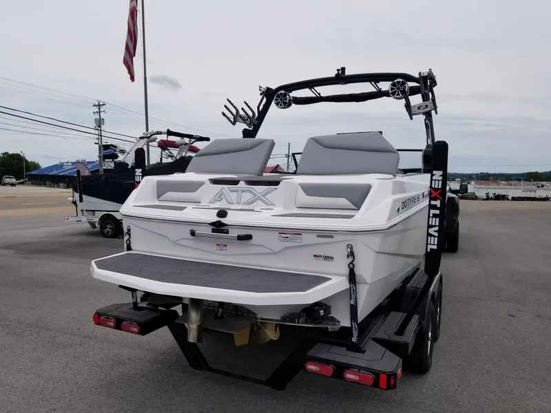 Slide: The Image of 2023 ATX Surf Boats 20 Type-S, rear view, on trailer, outdoor display. - 26