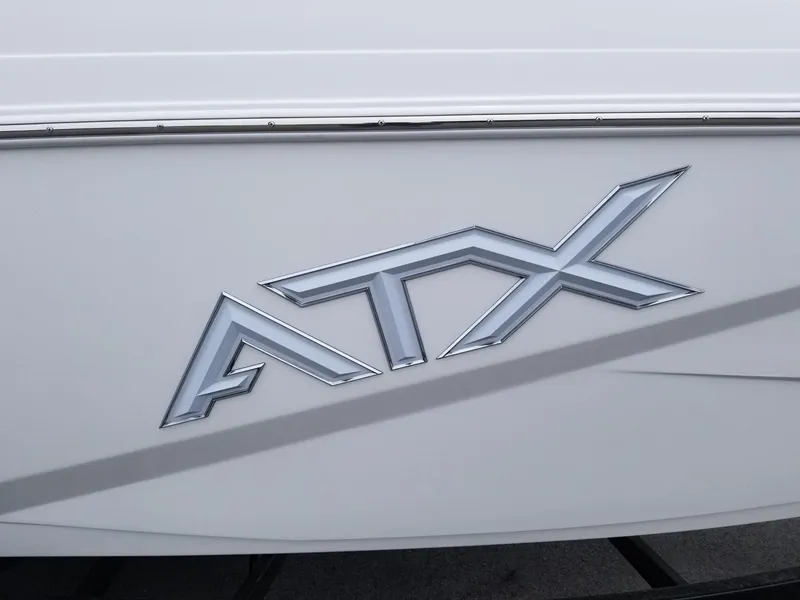 Slide: The Image of 2023 ATX Surf Boats 20 Type-S logo on white boat exterior. - 28