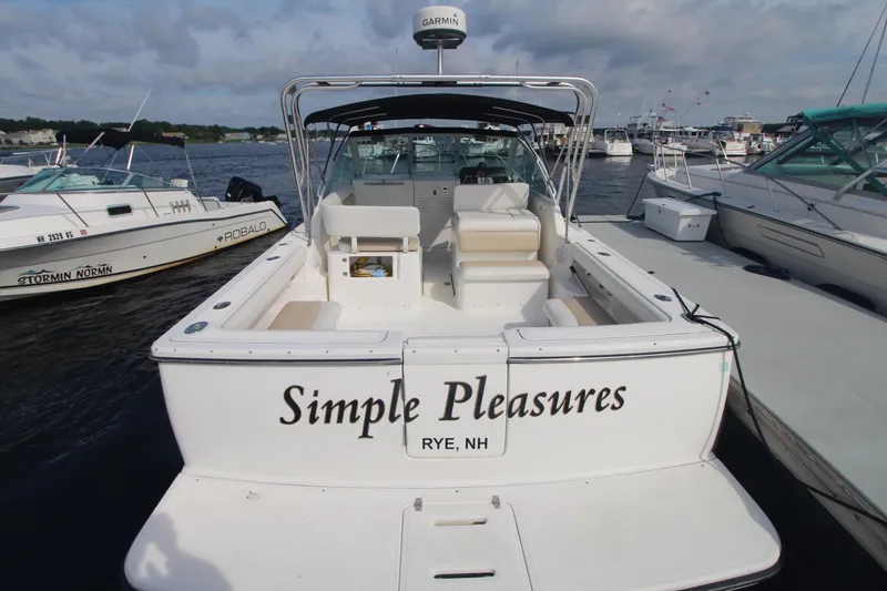 Slide: The Image of 2001 Tiara Yachts 2900 Coronet docked, named "Simple Pleasures," in Rye, NH marina. - 2