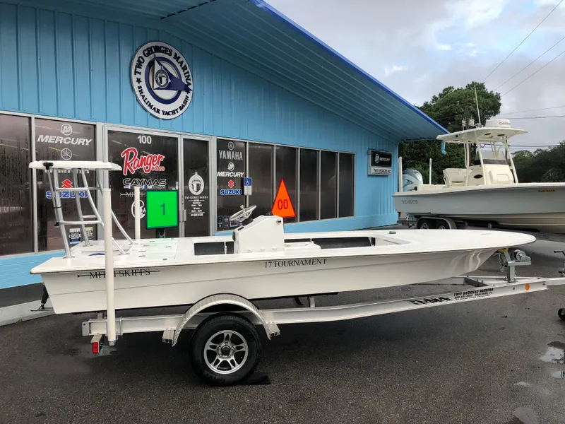 Slide: The Image of 2025 Mitzi Skiffs 17 boat on trailer outside dealership. - 0