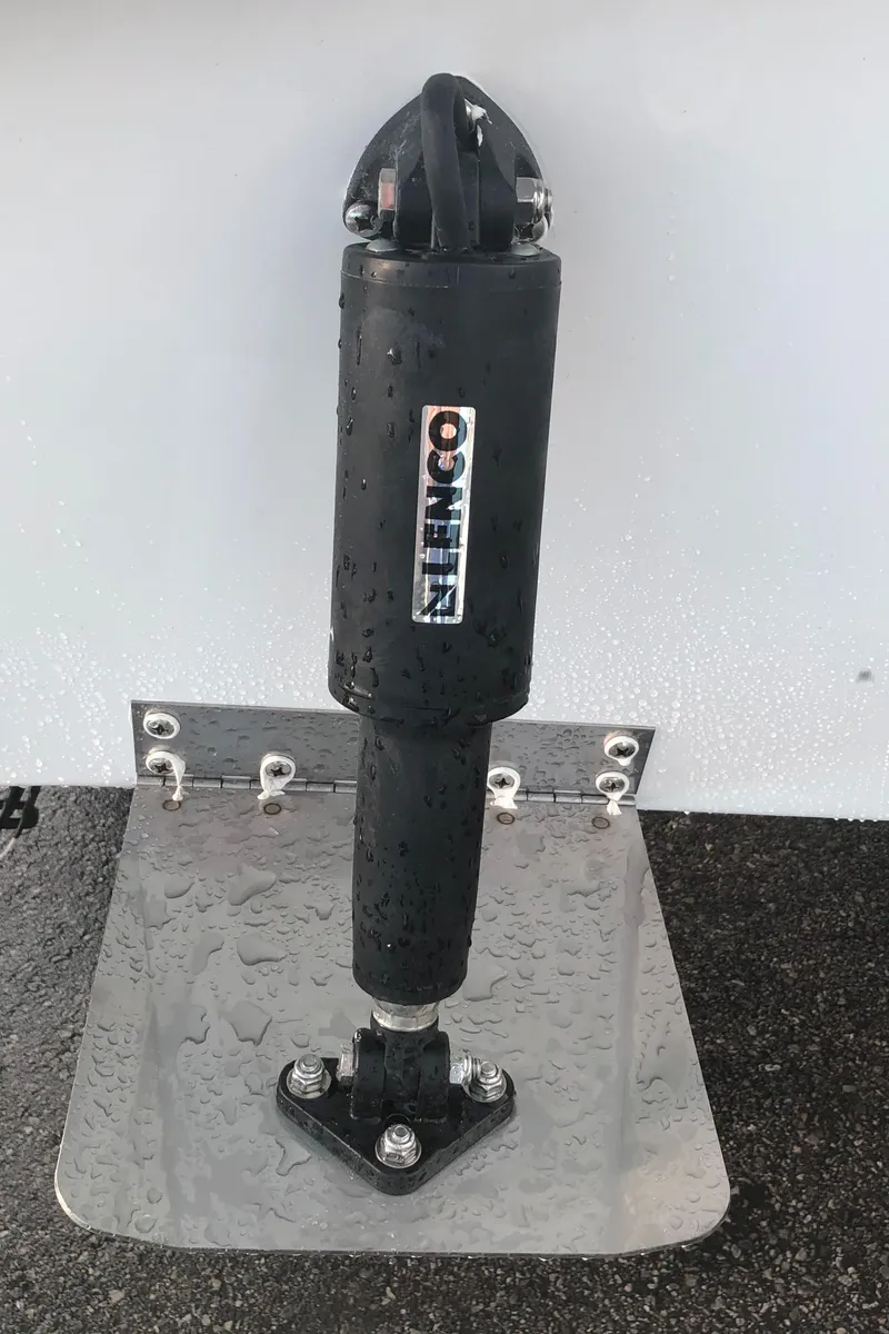 Slide: The Image of 2025 Mitzi Skiffs 17 trim tab with Lenco actuator on a boat. - 23