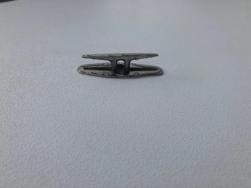 Slide: The Image of Mitzi Skiffs 17 boat cleat, 2025 model, on a textured surface. - 9