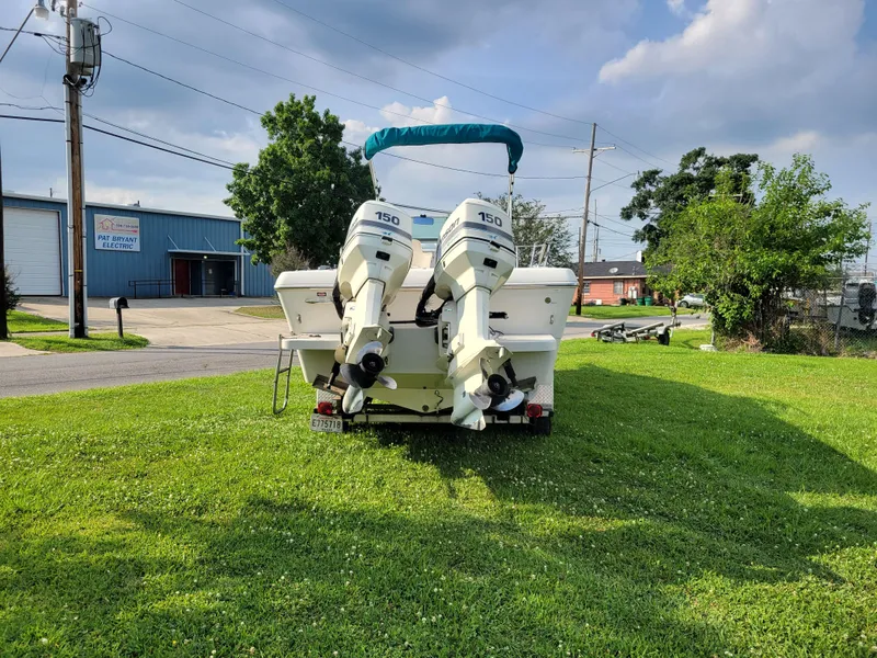 Slide: The Image of 1996 Pro-Line 231 Walk Around Cuddy with twin 150 HP outboard motors. - 4