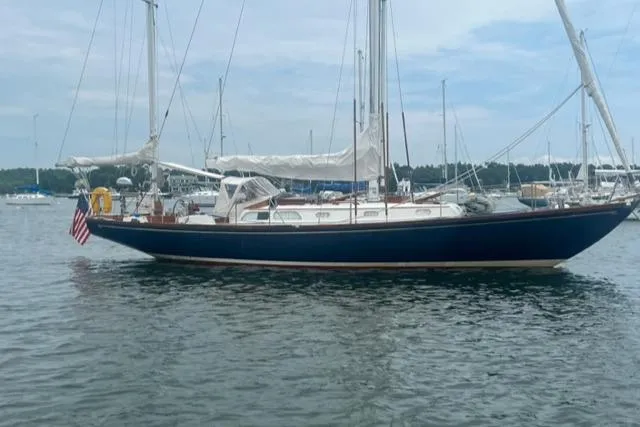 The Image of 1972 Hinckley Bermuda 40 MK III Yawl sailing on calm waters, showcasing classic design. - 0