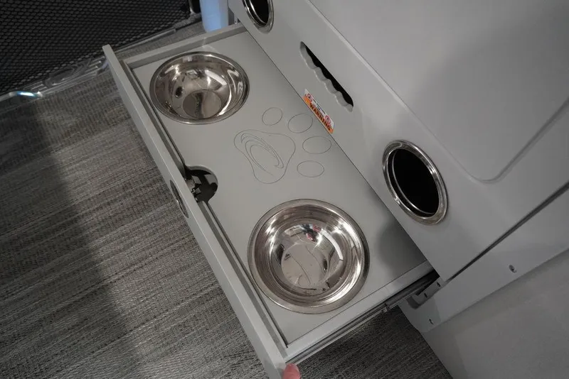 Slide: The Image of 2024 Crest Continental 250 SLS CP3 pet-friendly drawer with built-in stainless steel bowls. - 16