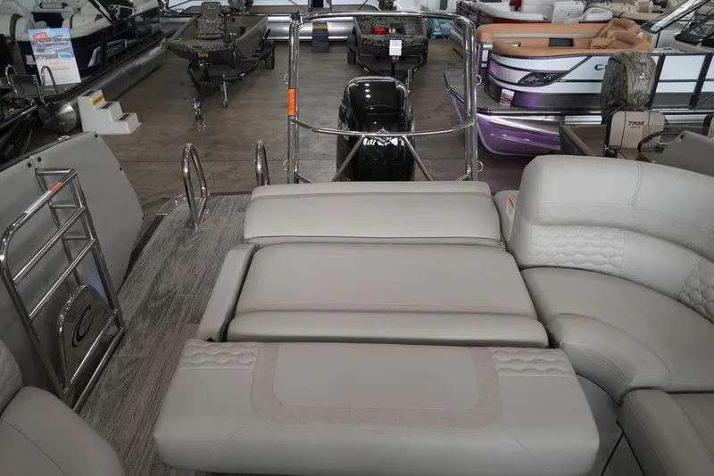 Slide: The Image of 2024 Crest Continental 250 SLS CP3 boat interior with luxurious seating and modern design. - 6
