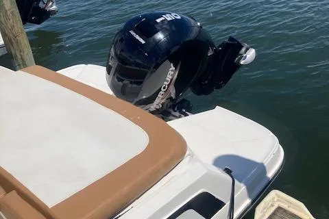 Slide: The Image of 2021 Bayliner VR5 boat with Mercury outboard motor on the water. - 3