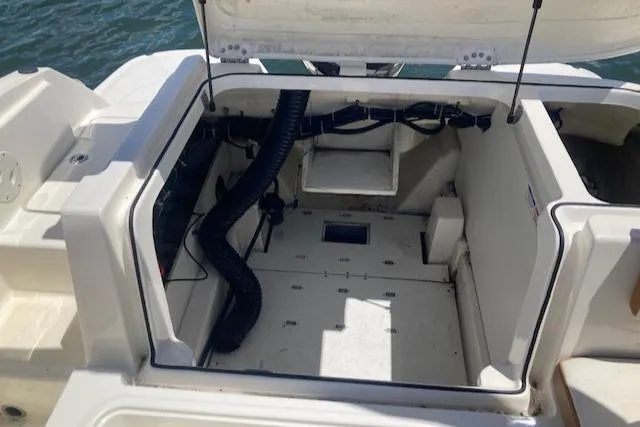 Slide: The Image of 2021 Bayliner VR5 boat engine compartment with open hatch. - 6