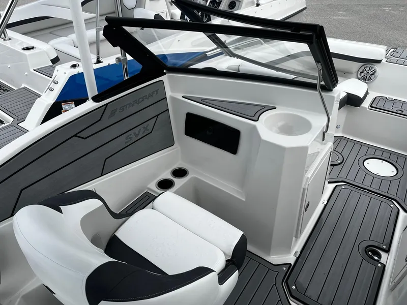 Slide: The Image of 2024 Starcraft SVX 190 boat interior with seating and console. - 8