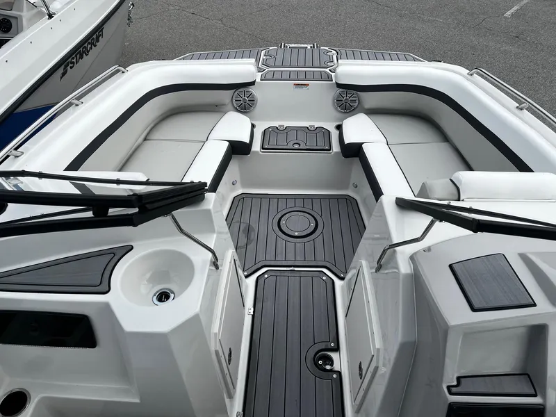 Slide: The Image of 2024 Starcraft SVX 190 boat interior with seating and storage compartments. - 10