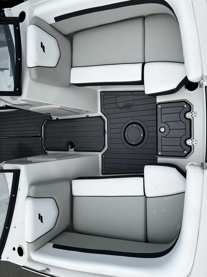 Slide: The Image of 2024 Starcraft SVX 190 boat interior with white and black seating - 14