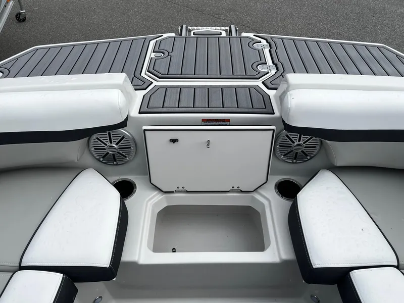 Slide: The Image of 2024 Starcraft SVX 190 boat interior with seating and storage compartments. - 16