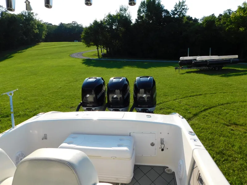 Slide: The Image of Solid Craft LIMITED 40 boat with four engines on grassy field, 2005 model. - 13