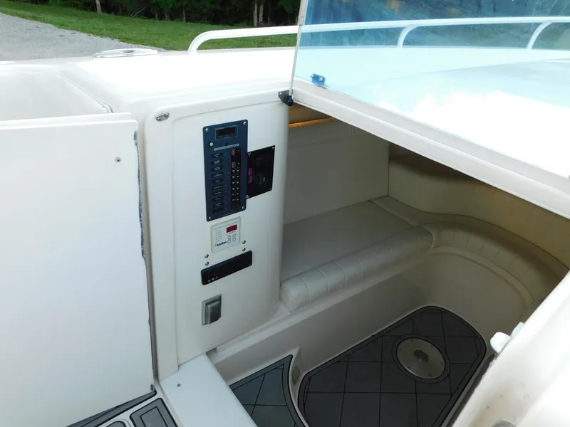 Slide: The Image of Interior view of a 2005 Solid Craft LIMITED 40 boat, featuring seating and control panel. - 19