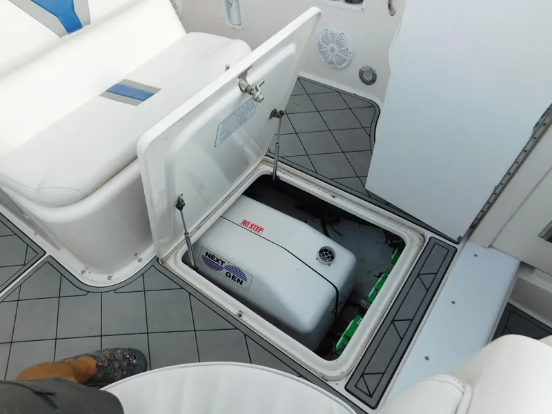 Slide: The Image of Open hatch on Solid Craft LIMITED 40 boat, revealing engine compartment, 2005 model. - 31