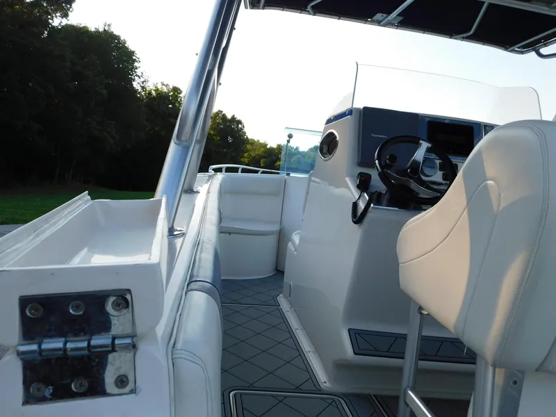 Slide: The Image of Interior view of a 2005 Solid Craft LIMITED 40 boat, featuring steering console and seating. - 44