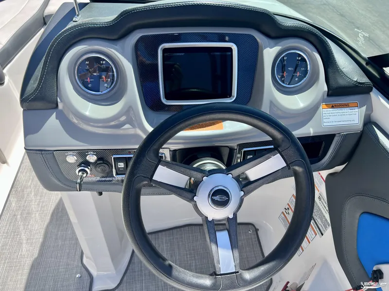 Slide: The Image of 2019 Chaparral Vortex 223 VRX dashboard with steering wheel and gauges. - 5