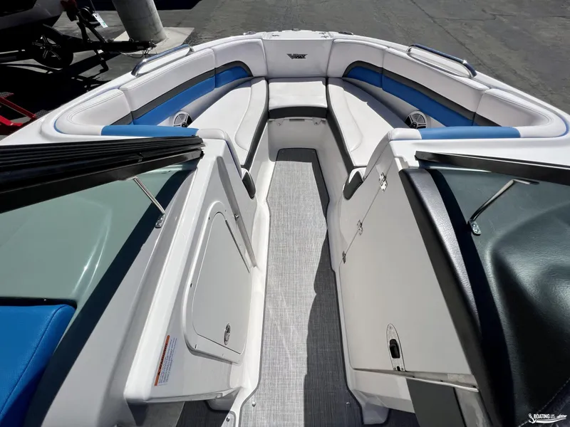 Slide: The Image of 2019 Chaparral Vortex 223 VRX boat interior with spacious seating and modern design. - 6