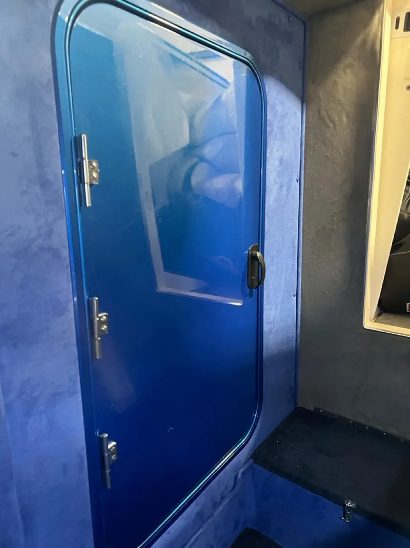 Slide: The Image of Interior cabin door of a 2007 Fountain 42 Lightning boat. - 30