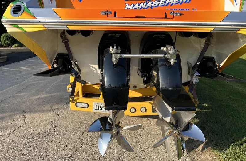 Slide: The Image of Rear view of a 2007 Fountain 42 Lightning boat with dual propellers. - 9