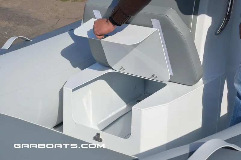 Slide: The Image of Gala A450 2025 model boat storage compartment being opened. - 5