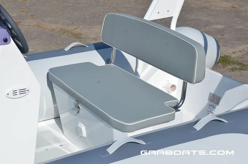 Slide: The Image of Gala A450 2025 model boat seat with storage compartment, gray upholstery. - 7