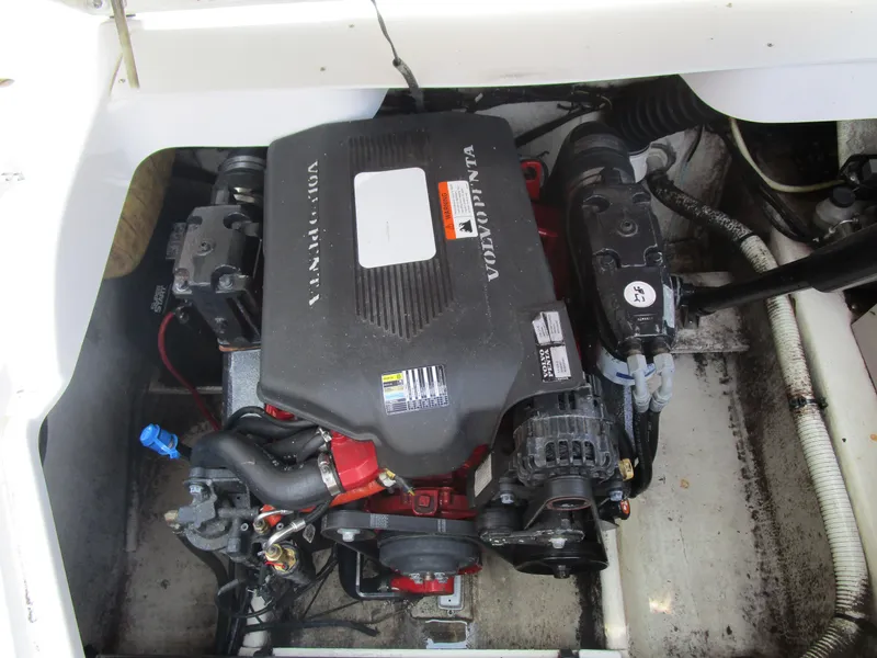 Slide: The Image of 2005 Four Winns Fun Ship 214 engine compartment with Volvo Penta engine. - 15