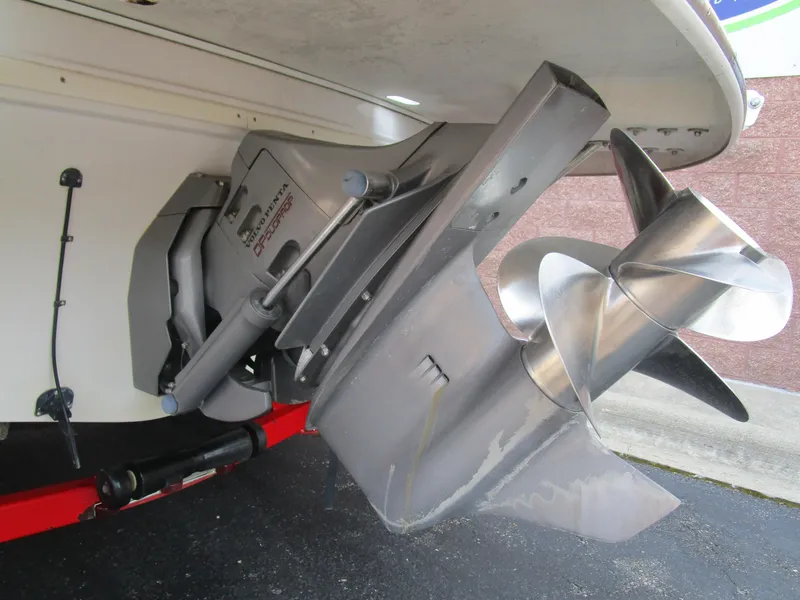 Slide: The Image of 2005 Four Winns Fun Ship 214 boat propeller and outdrive close-up. - 16