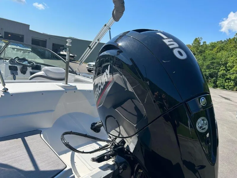 Slide: The Image of 2022 NauticStar 203DC Sport Deck with Mercury 150 outboard engine. - 10