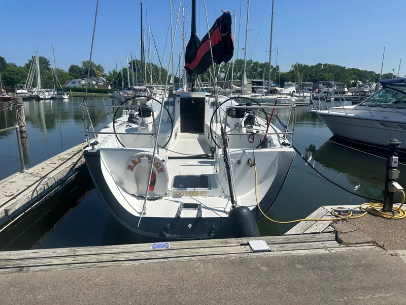 Slide: The Image of A 2001 Farr Concordia docked at a calm marina. - 5
