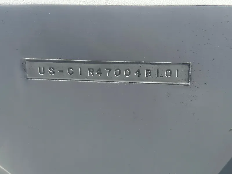 Slide: The Image of Serial number on a boat hull, possibly for identification purposes. - 6
