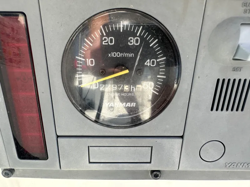 Slide: The Image of Close-up of a Yanmar engine tachometer with hour meter. - 4