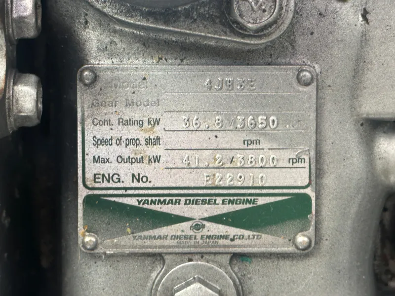 Slide: The Image of Close-up of a Yanmar diesel engine plate with technical specifications. - 17